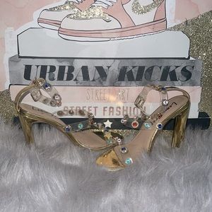 Fashion nova size 7 gold multicolored rhinestone heels.